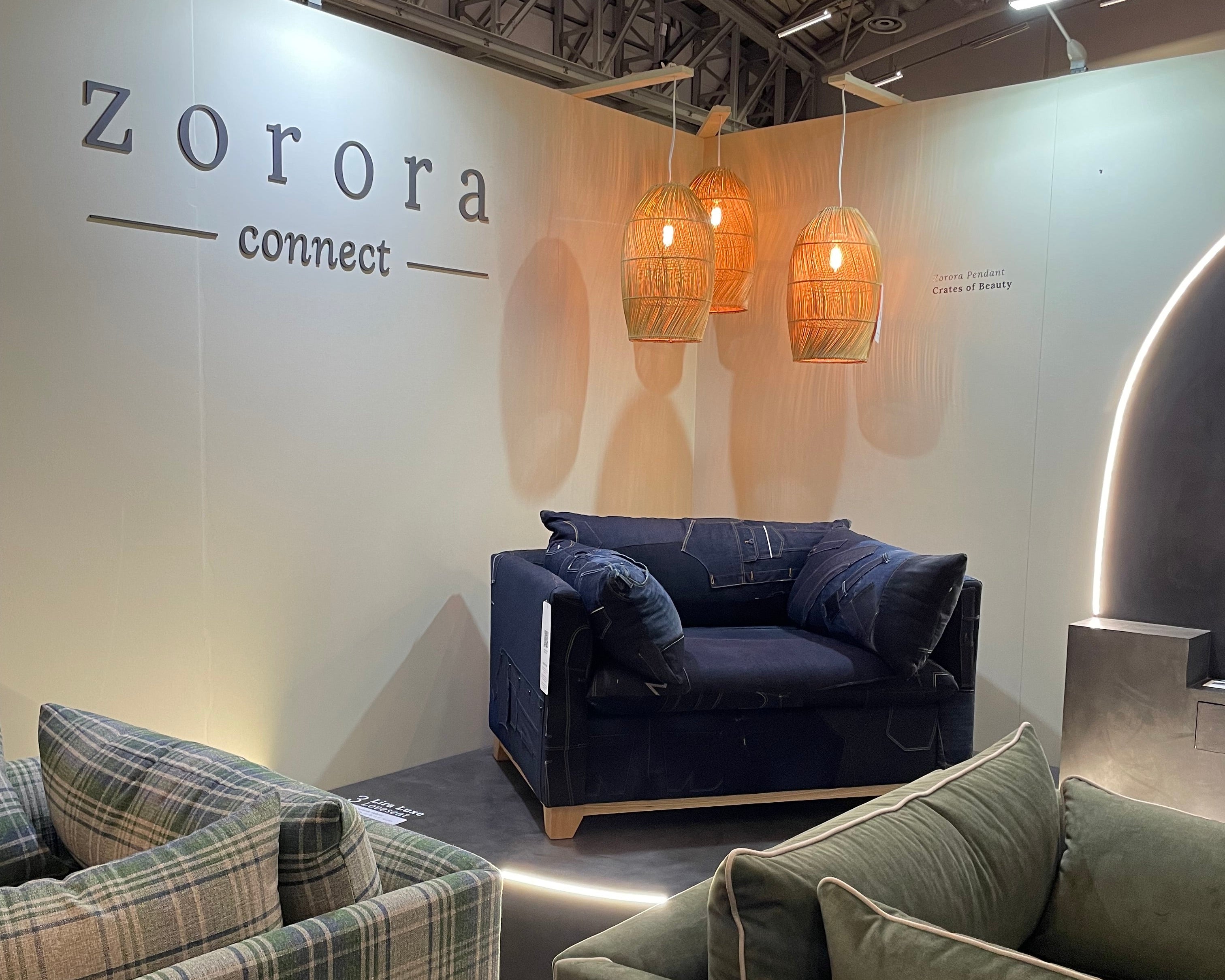 Modern interior design with Zorora furniture and lighting fixtures by us for Decorex Cape Town 2024. S-line weave modern lampshade for Zorora sofa, hand woven bamboo on stainless steel, locally made

