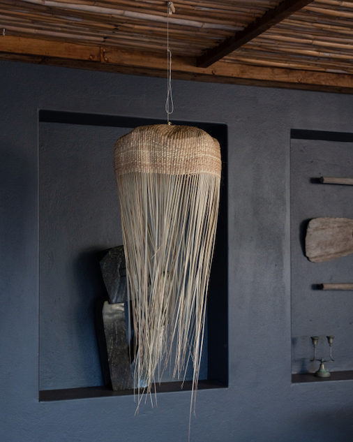 Woven basket with hanging fibers handmade in Cape Town woven lighting