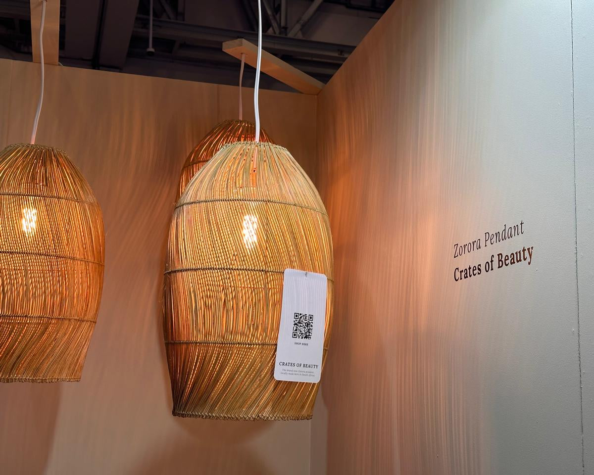 Modern interior design with Zorora furniture and lighting fixtures by us for Decorex Cape Town 2024. S-line weave modern lampshade for Zorora sofa, hand woven bamboo on stainless steel, locally made for lodges, restaurants, hotels, interior design projects


