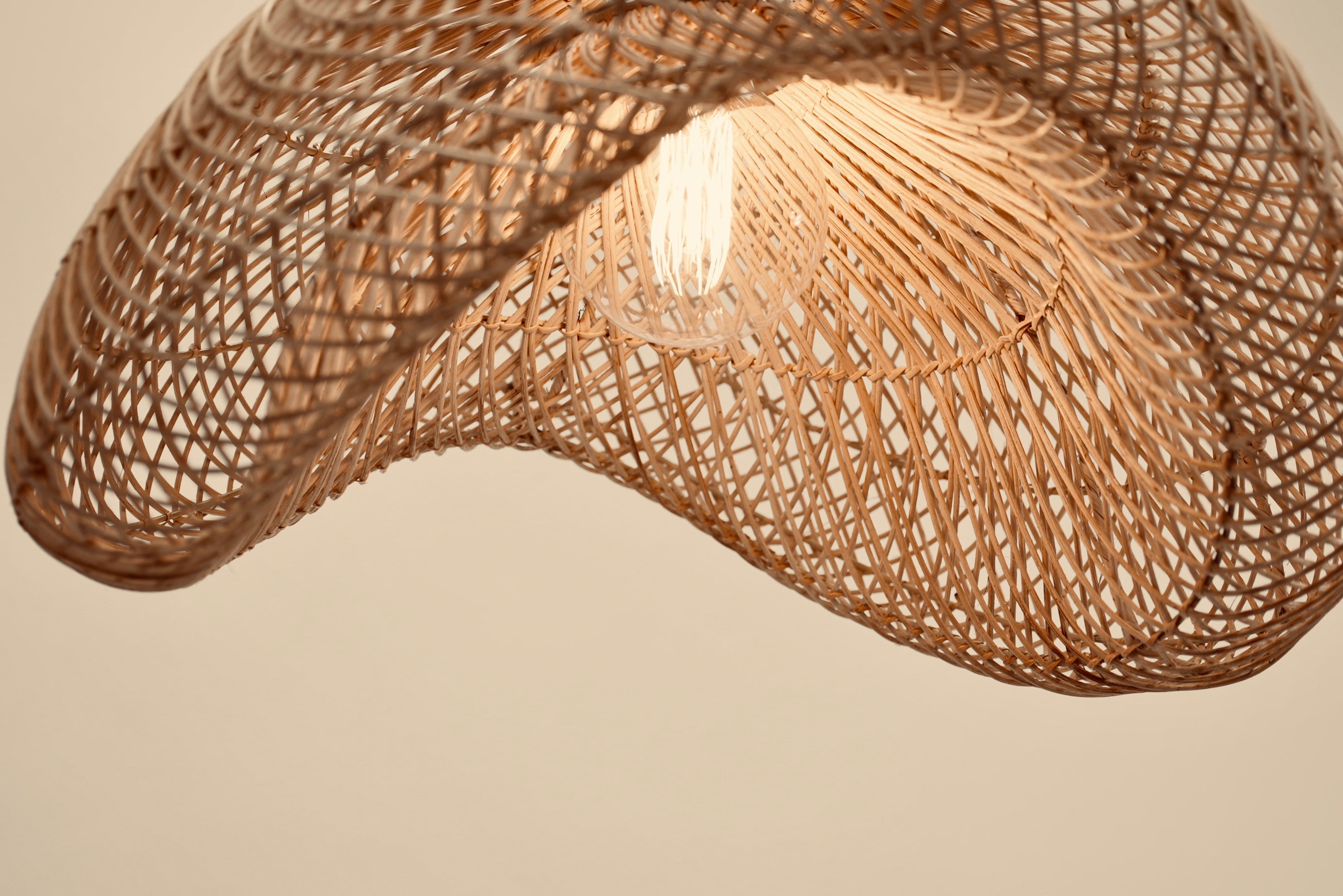 Woven pendant lighting as seen in Checkers' butcheries from bamboo on stainless steel in natural, black, or mixed pattern