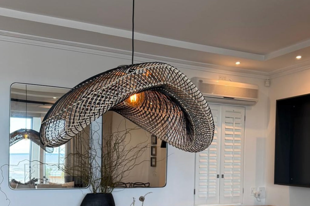 Woven pendant lighting as seen in Checkers' butcheries from bamboo on stainless steel in zebra finish black and natural 