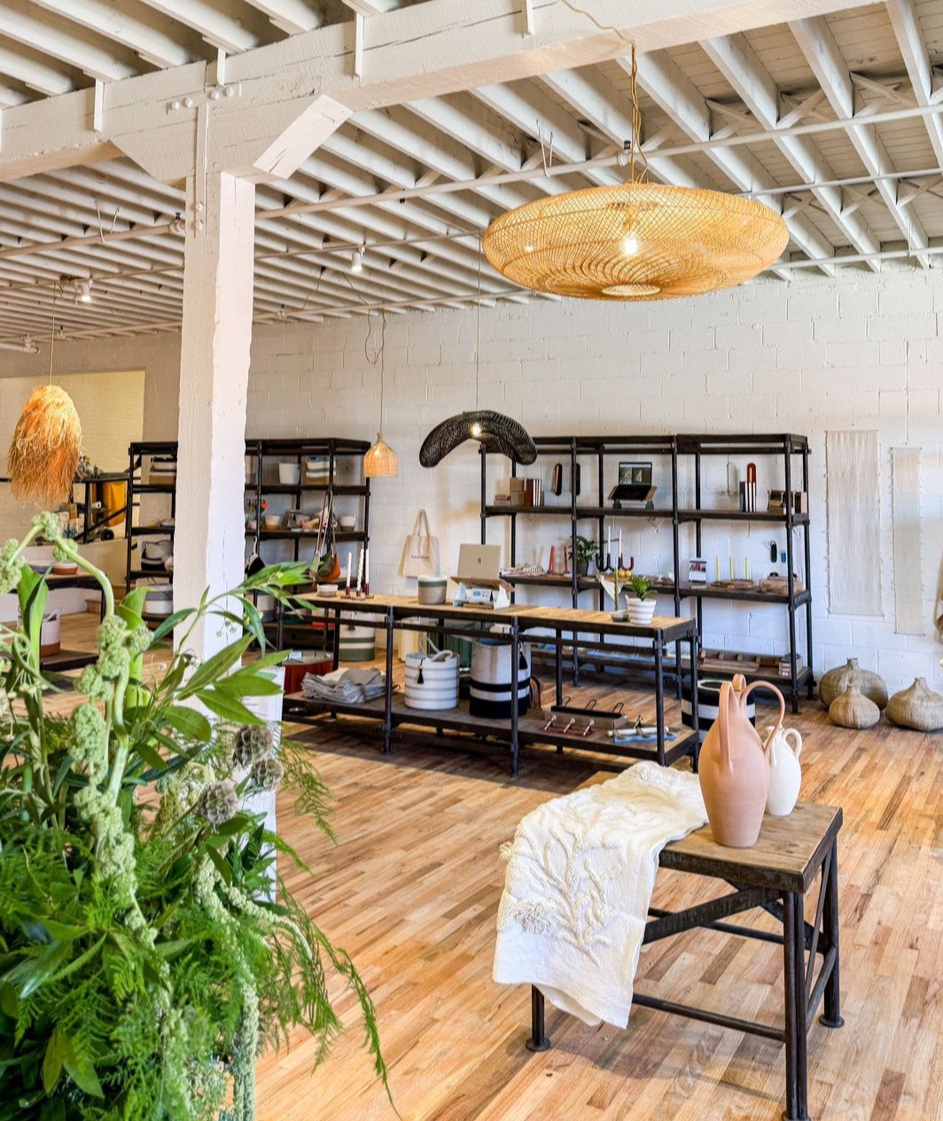 Crates of Beauty pendants and home furnishings on display at the High Point market in North Carolina, USA, 2024