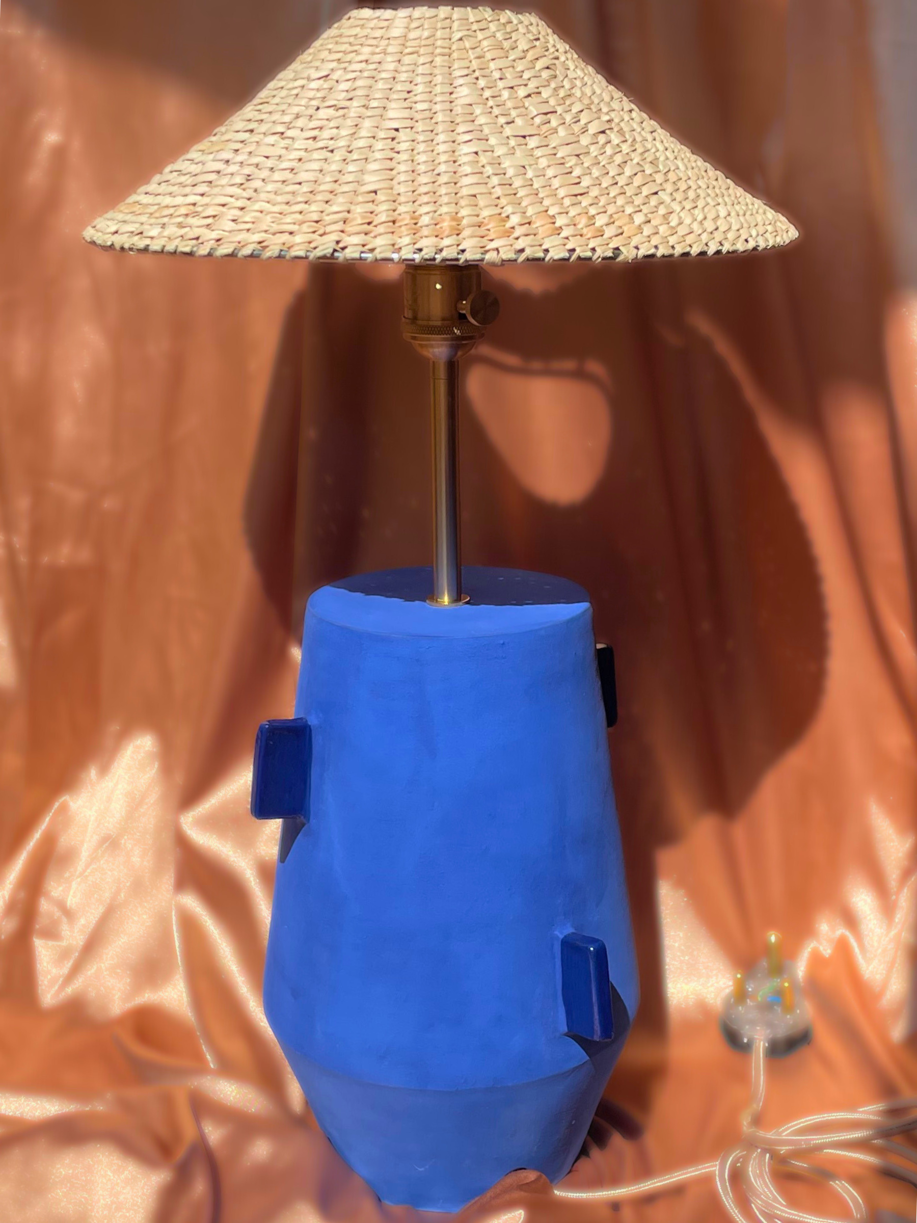 Lamp with a blue base and wicker shade brass fixtures custom cord