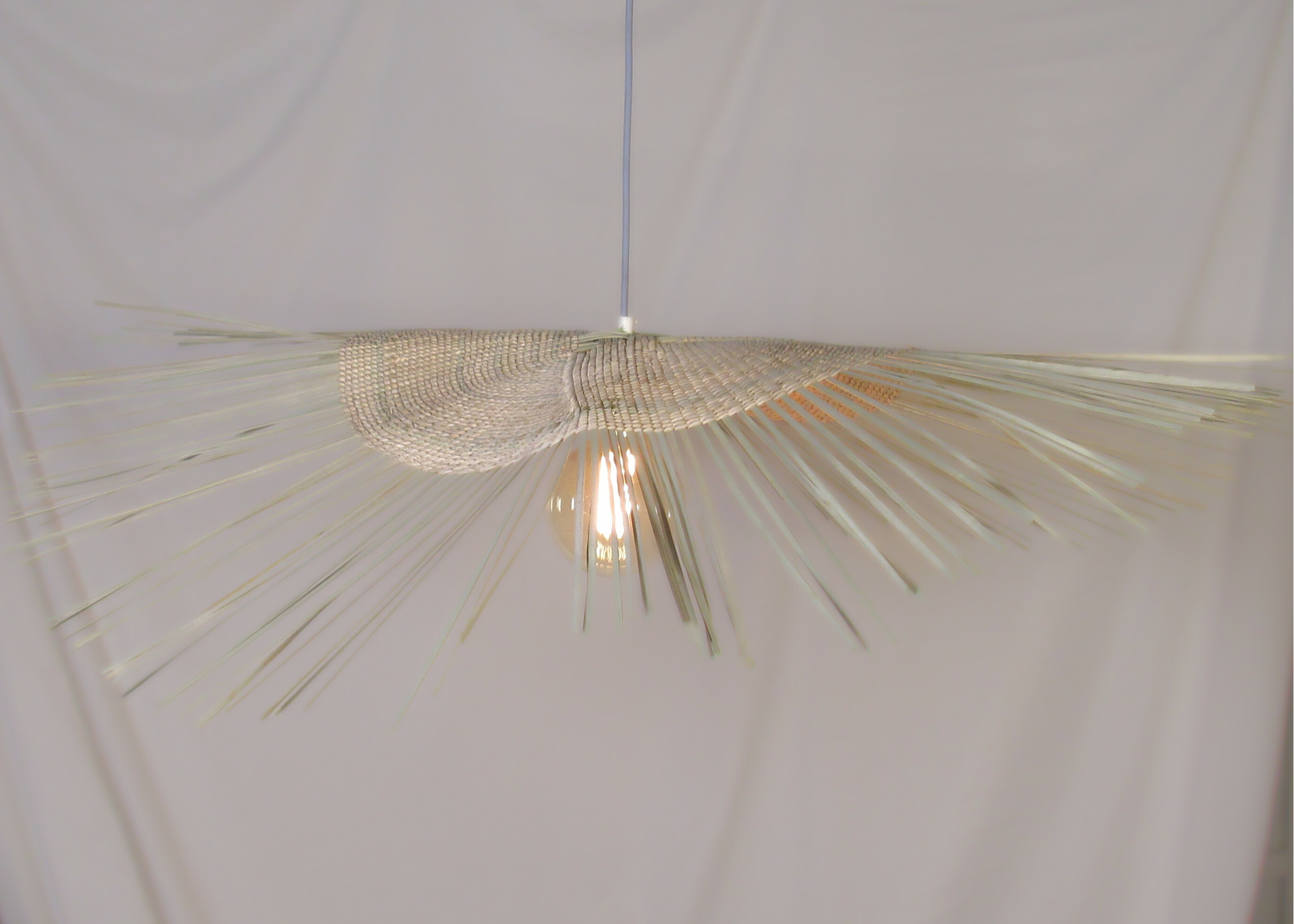 Woven pendant ilala grass handmade custom
Modern interior designer lighting fixtures and lampshades, hand woven, locally made for lodges, restaurants, hotels, interior design projects
Living room statement hanging light with dense tight weave 
