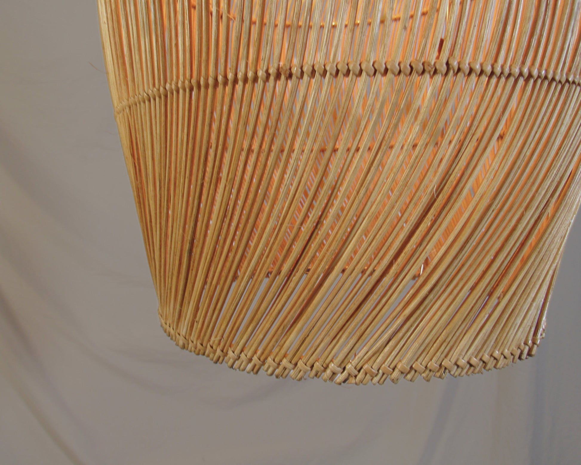 woven pendant baboo rattan cane wicker handmade custom
Modern interior design with Zorora furniture and lighting fixtures by us for Decorex Cape Town 2024. S-line weave modern lampshade for Zorora sofa, hand woven bamboo on stainless steel, locally made for lodges, restaurants, hotels, interior design projects
