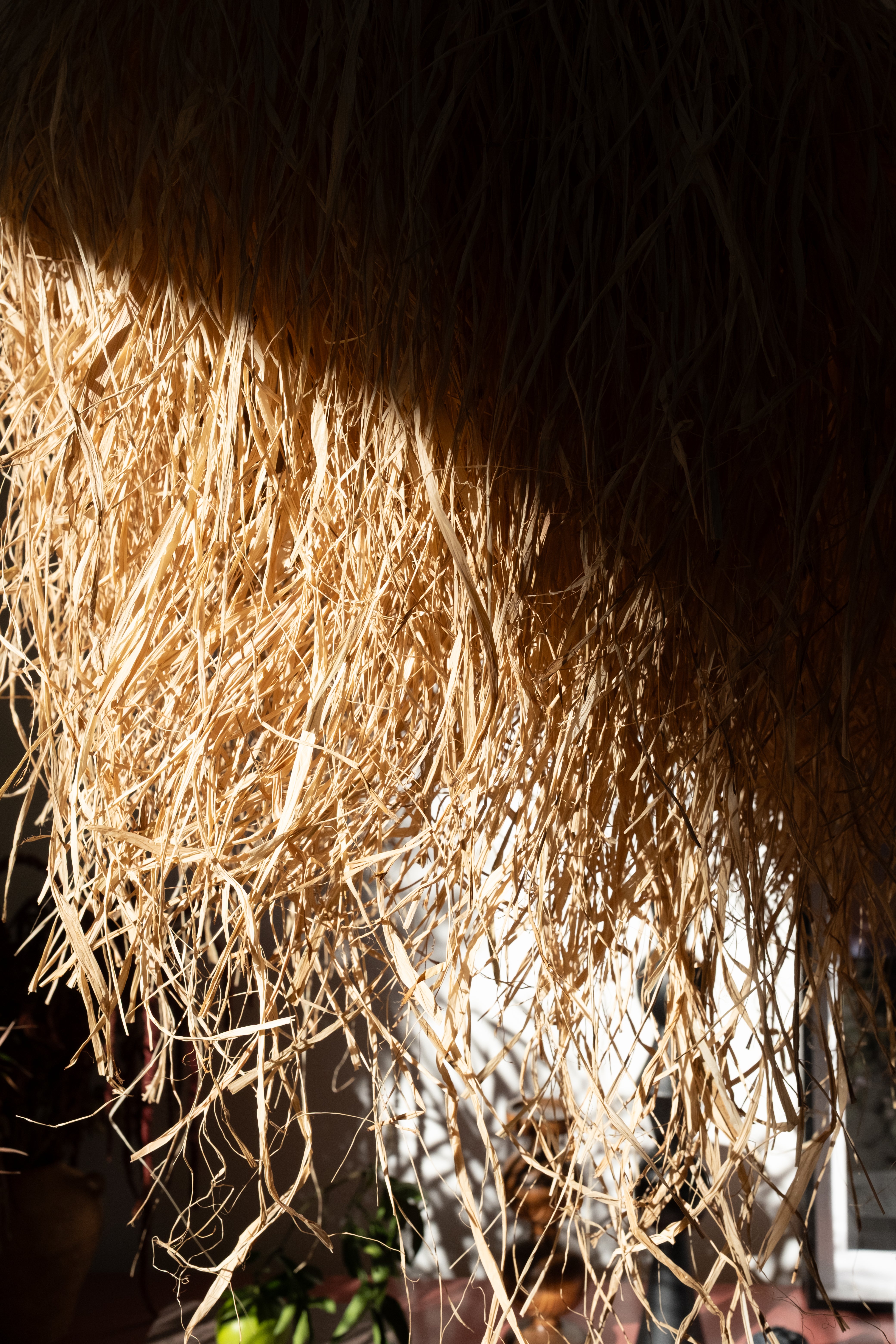 Decorative hanging pendant in raffia on stainless steel frames suitable for indoor and outdoor environments
crates_of_beauty_
