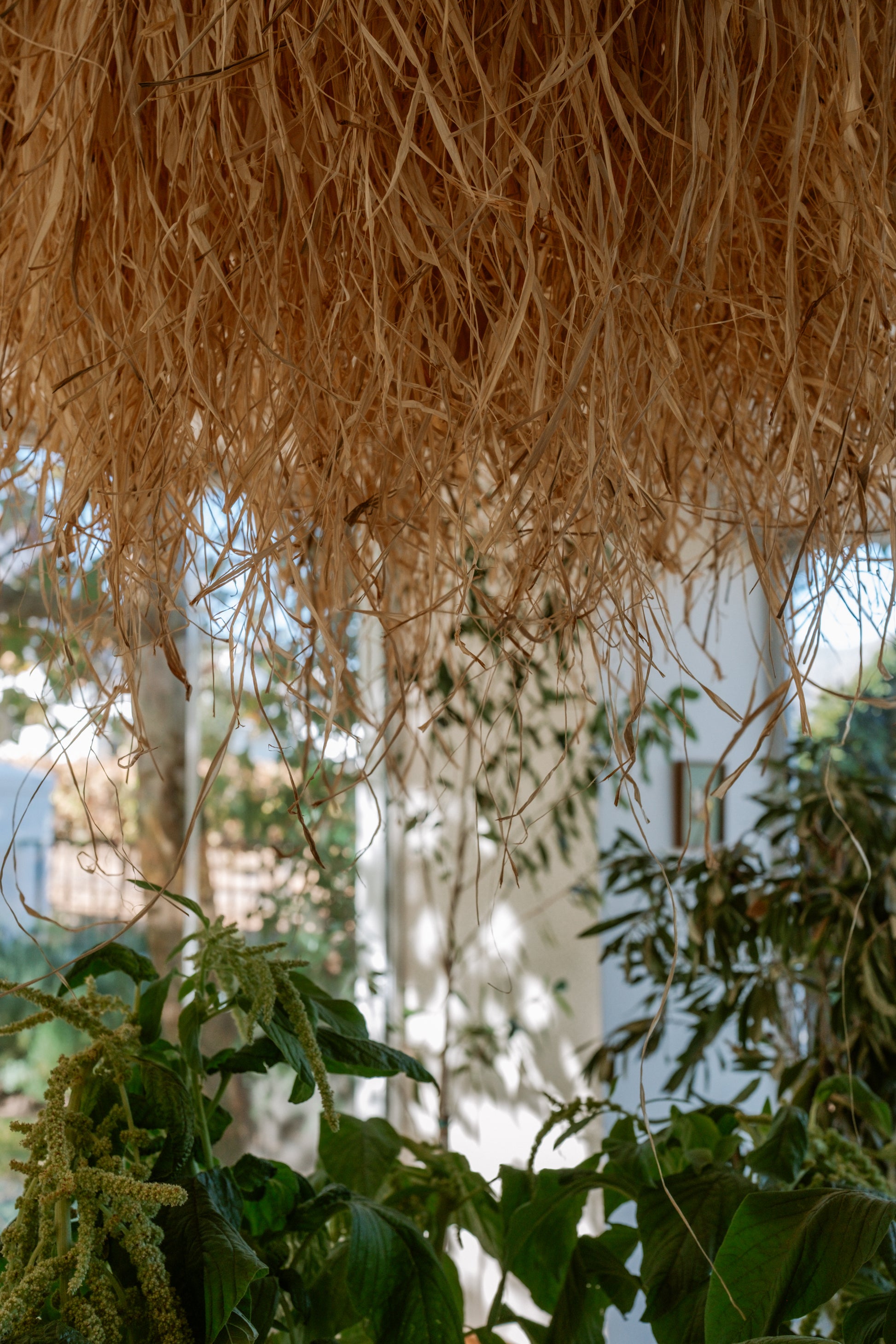 Close-up of woven raffia lighting