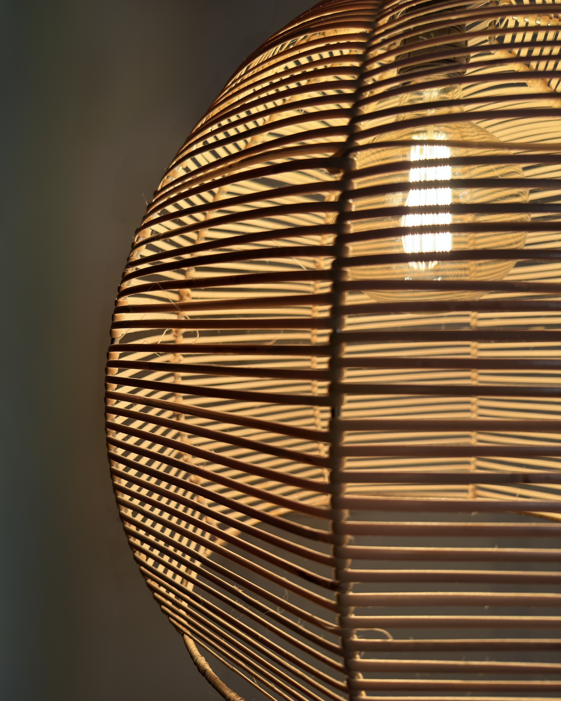 Locally made bespoke lighting, customisable, stainless steel frames, indoor and outdoor friendly, ambient woven pendants

