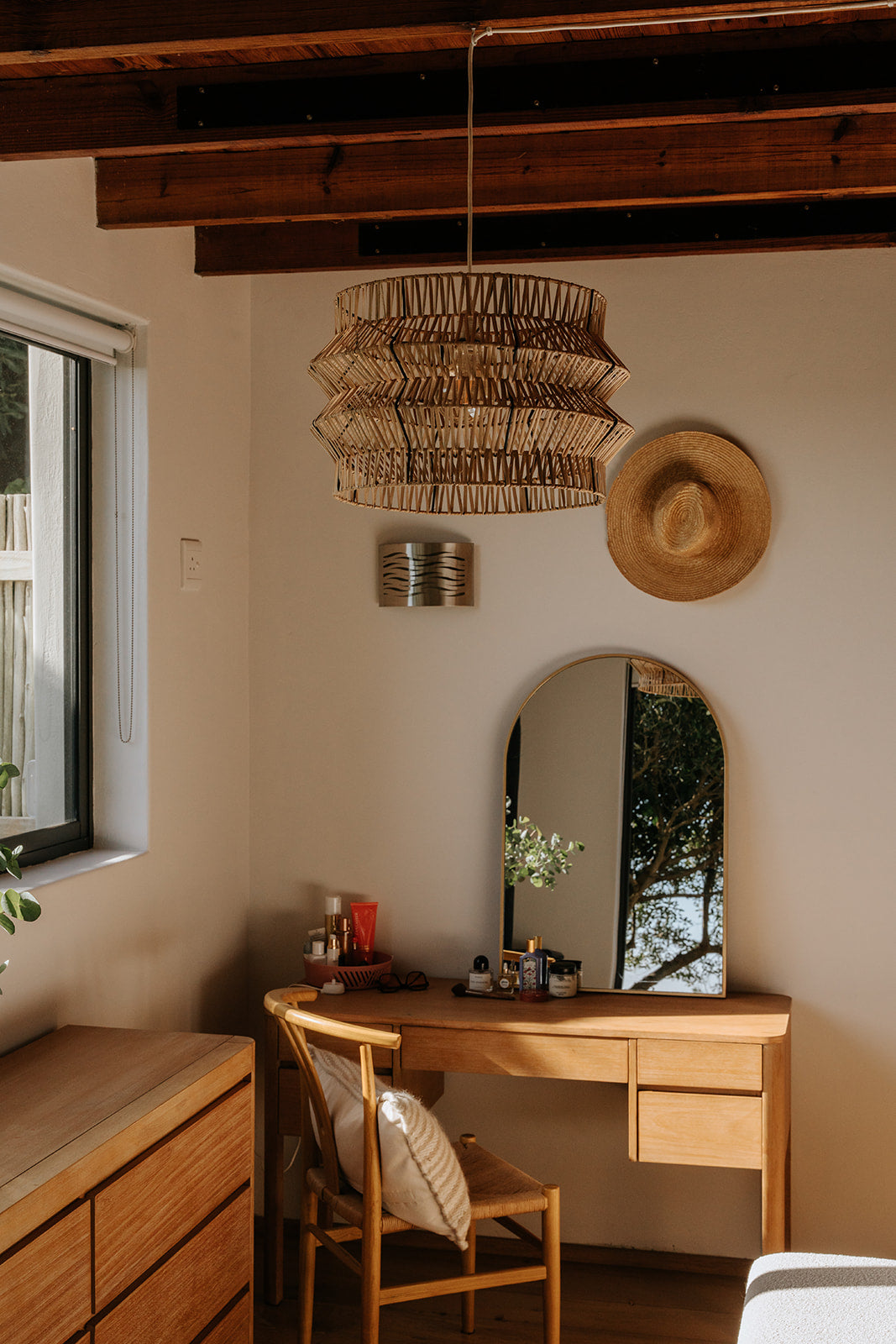 The Safari pendant on black powder coated frame from rattan peel, perfect for indoor and outdoor environments, hand woven, locally made, customisable. Great for resorts, hotels, restaurants, ambient lighting

