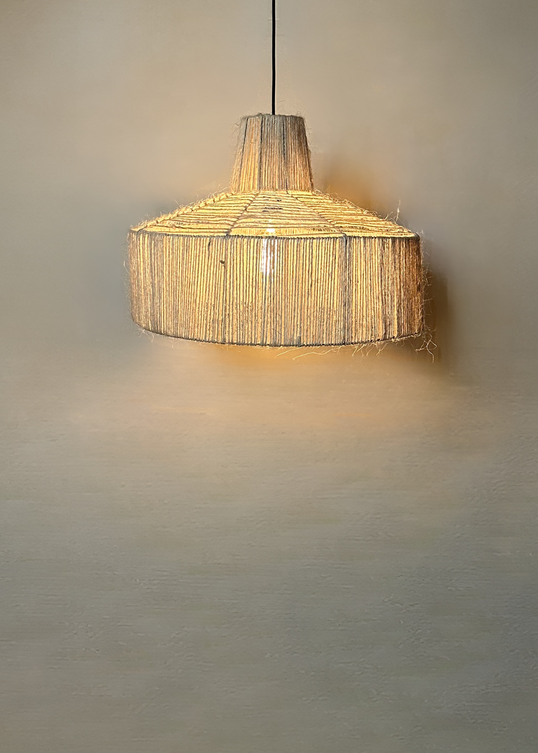 The Sisal pendant on stainless steel frame, suitable for indoors and outdoors, bespoke locally made hand woven lighting, fully customisable
