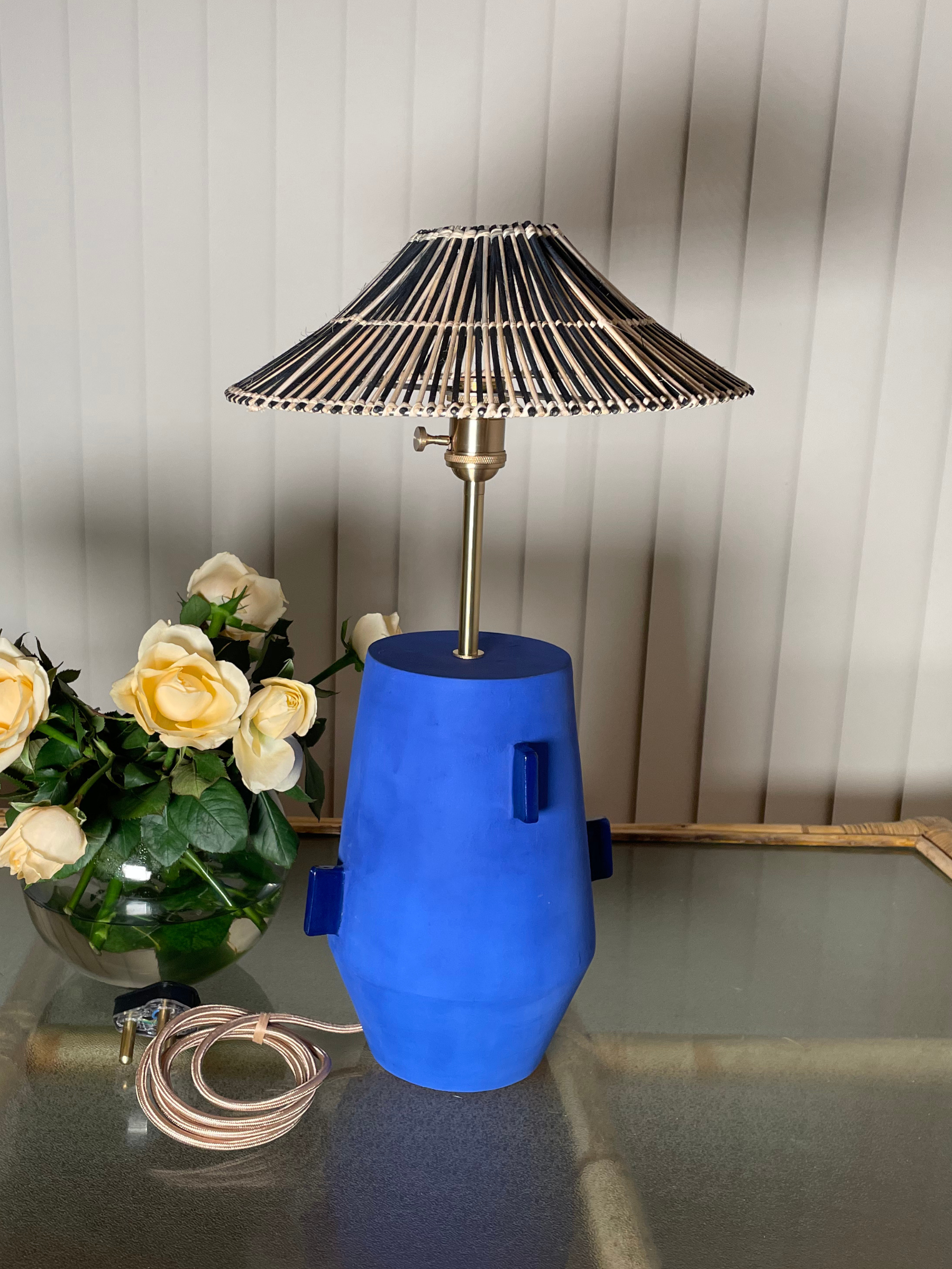 Blue ceramic table bedside lamp with a black and white striped shade  brass fixtures custom cord