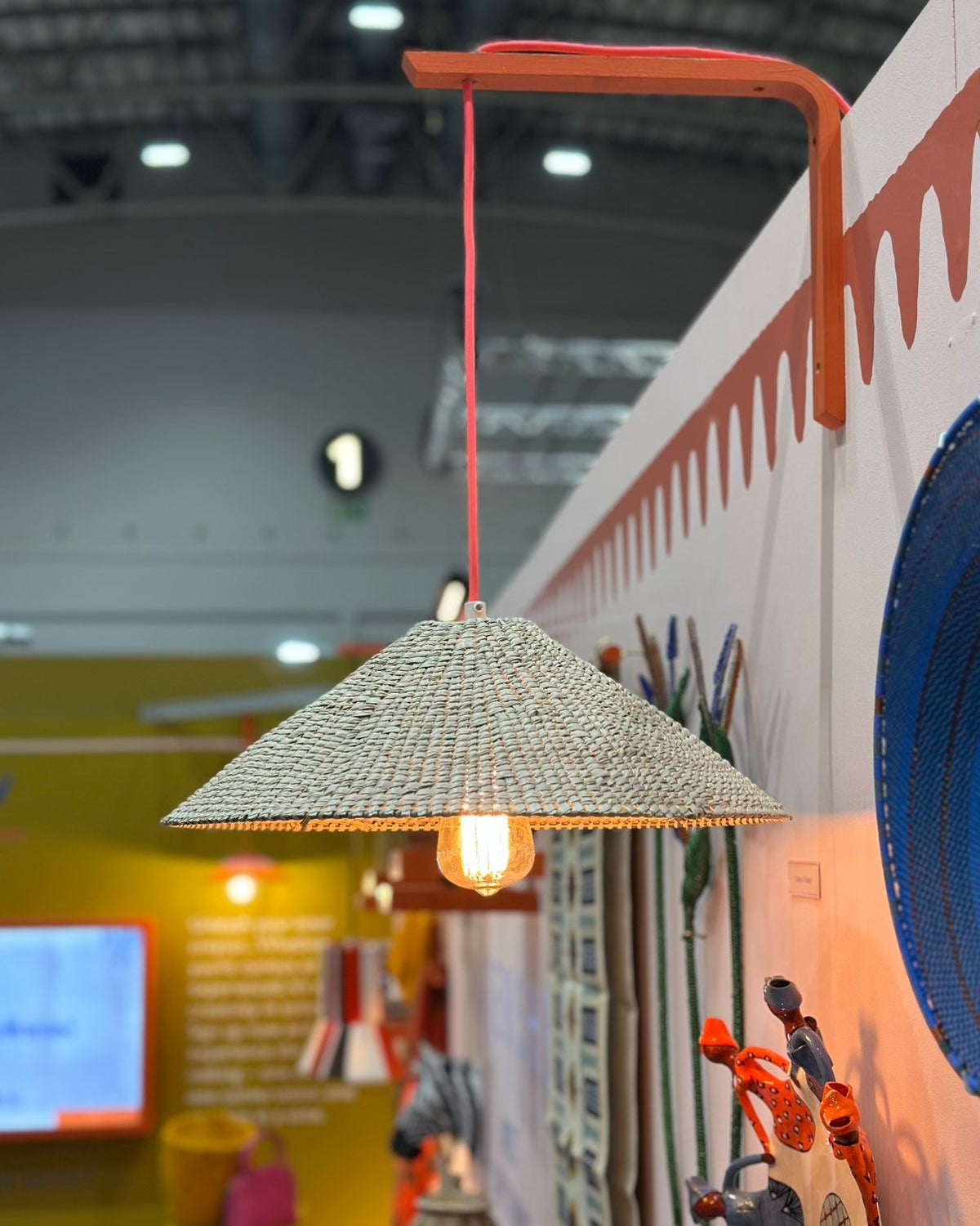 Woven pendant light hanging in the V&A Watershed Decorex stand in Cape Town 2025