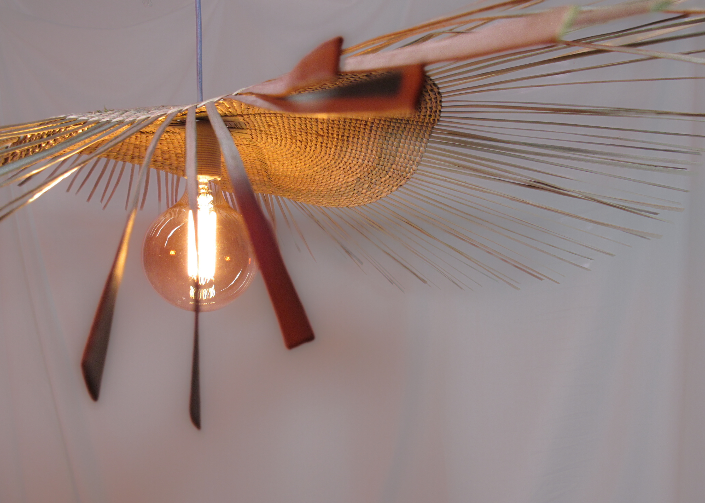 woven pendant ilala grass handmade custom
Modern interior designer lighting fixtures and lampshades, hand woven, locally made for lodges, restaurants, hotels, interior design projects
Living room statement hanging light with dense tight weave 
