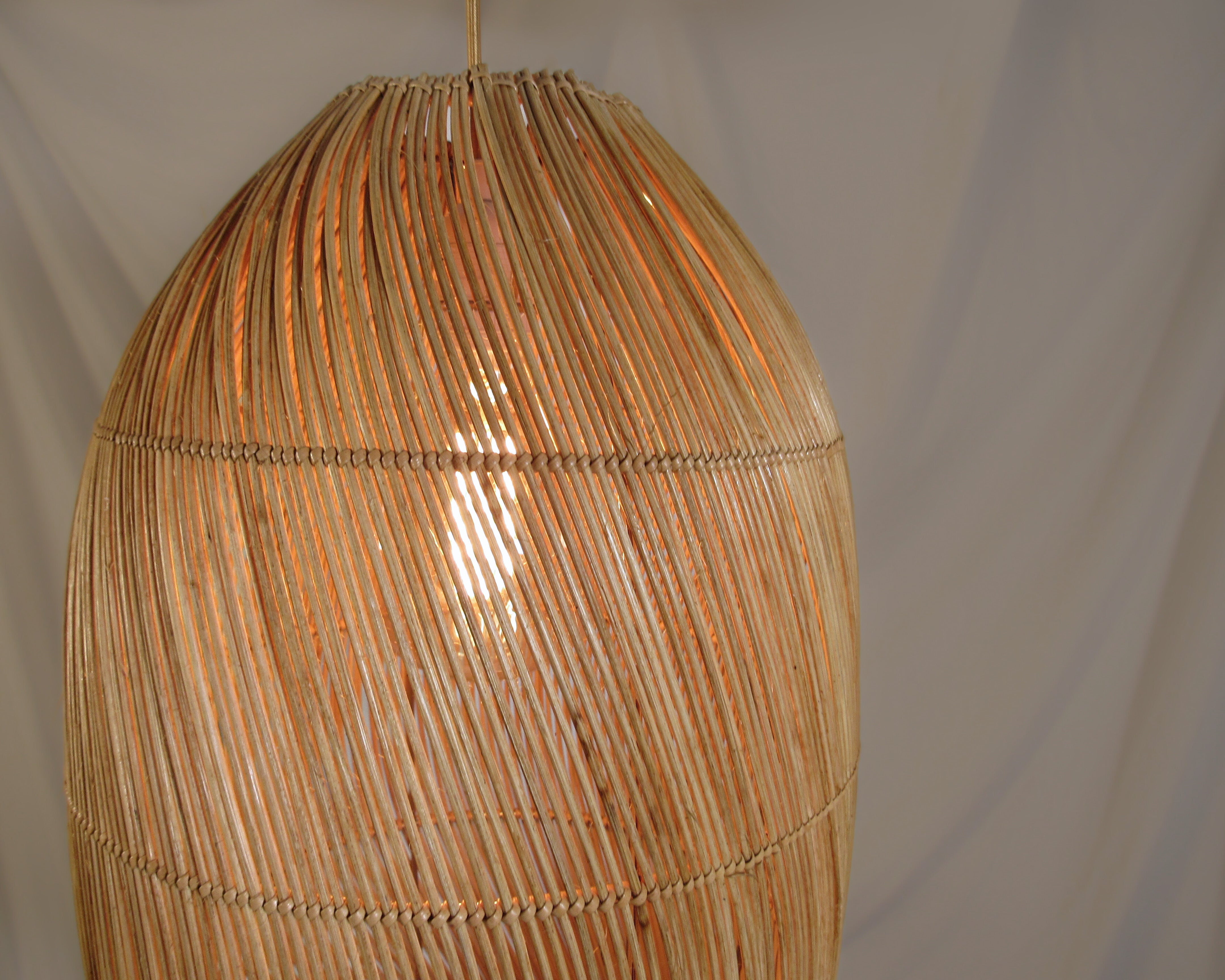 woven pendant baboo rattan cane wicker handmade custom
Modern interior design with Zorora furniture and lighting fixtures by us for Decorex Cape Town 2024. S-line weave modern lampshade for Zorora sofa, hand woven bamboo on stainless steel, locally made for lodges, restaurants, hotels, interior design projects
