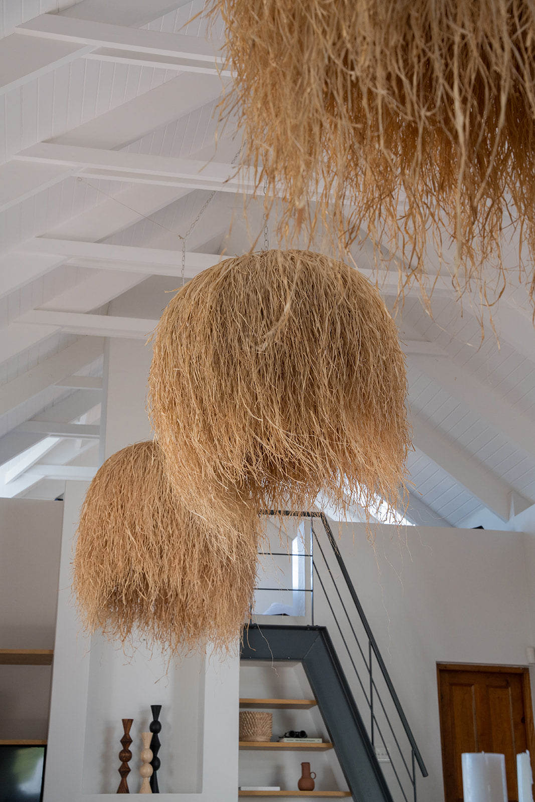 Large dome raffia pendant hanging light woven lighting handmade outdoor friendly customisable on stainless steel frames oversize lighting fixtures for lodges, restaurants, luxury resorts, interior design projects
