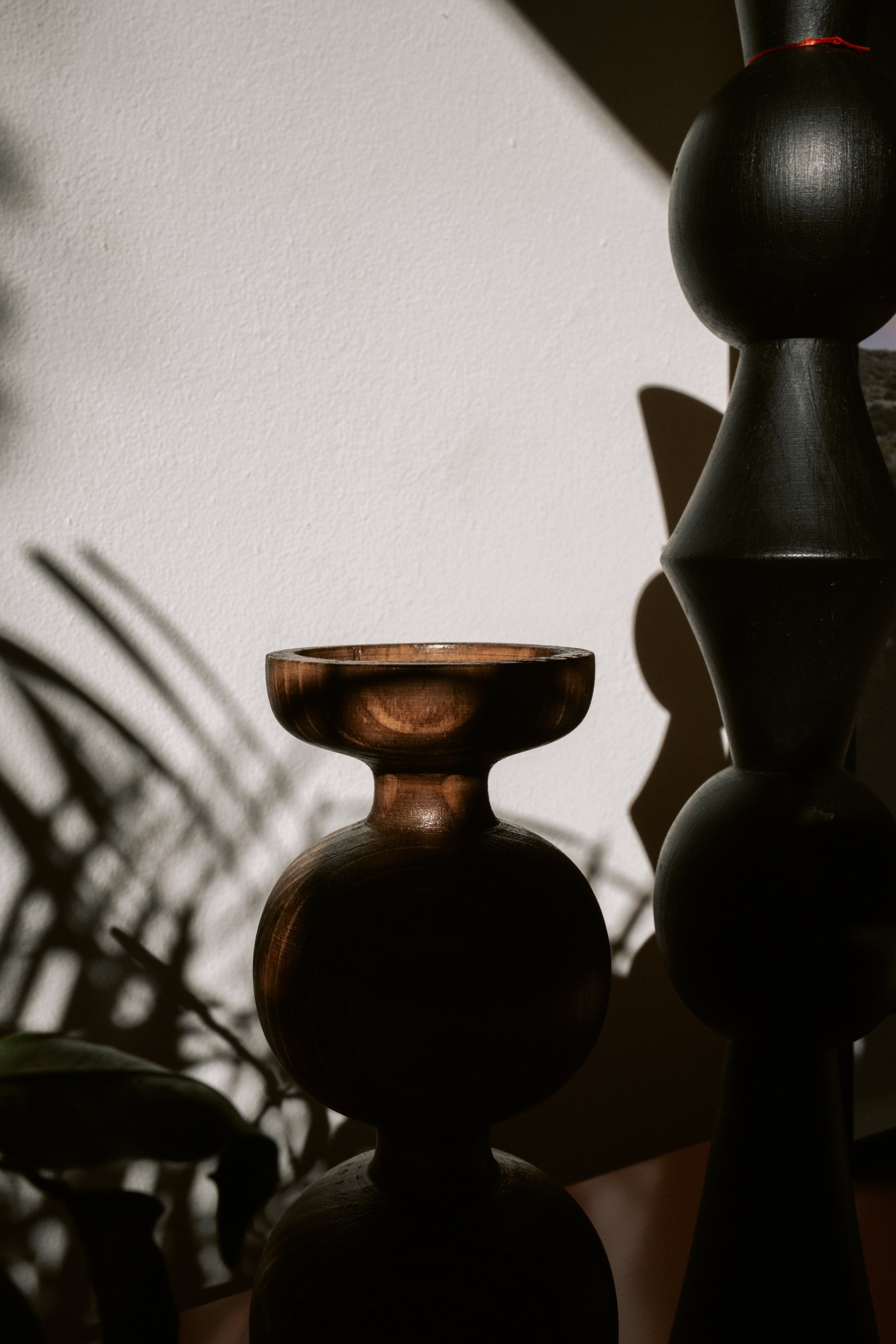 Dark wooden candle holder 
