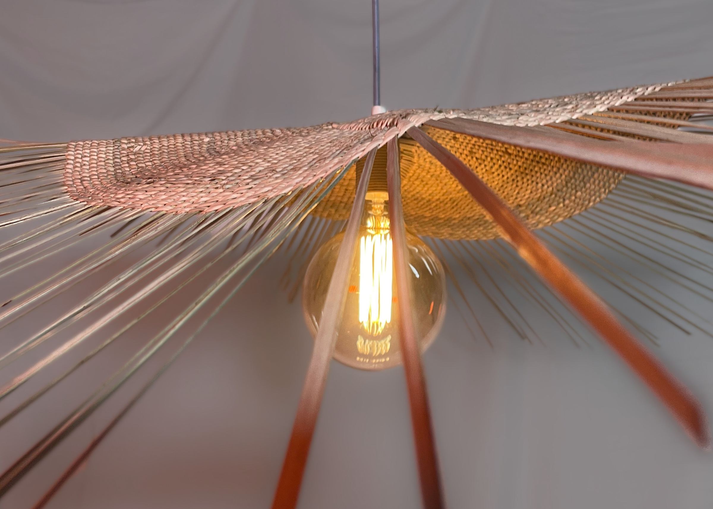 Woven pendant ilala grass handmade custom
Modern interior designer lighting fixtures and lampshades, hand woven, locally made for lodges, restaurants, hotels, interior design projects
Living room statement hanging light with dense tight weave 
