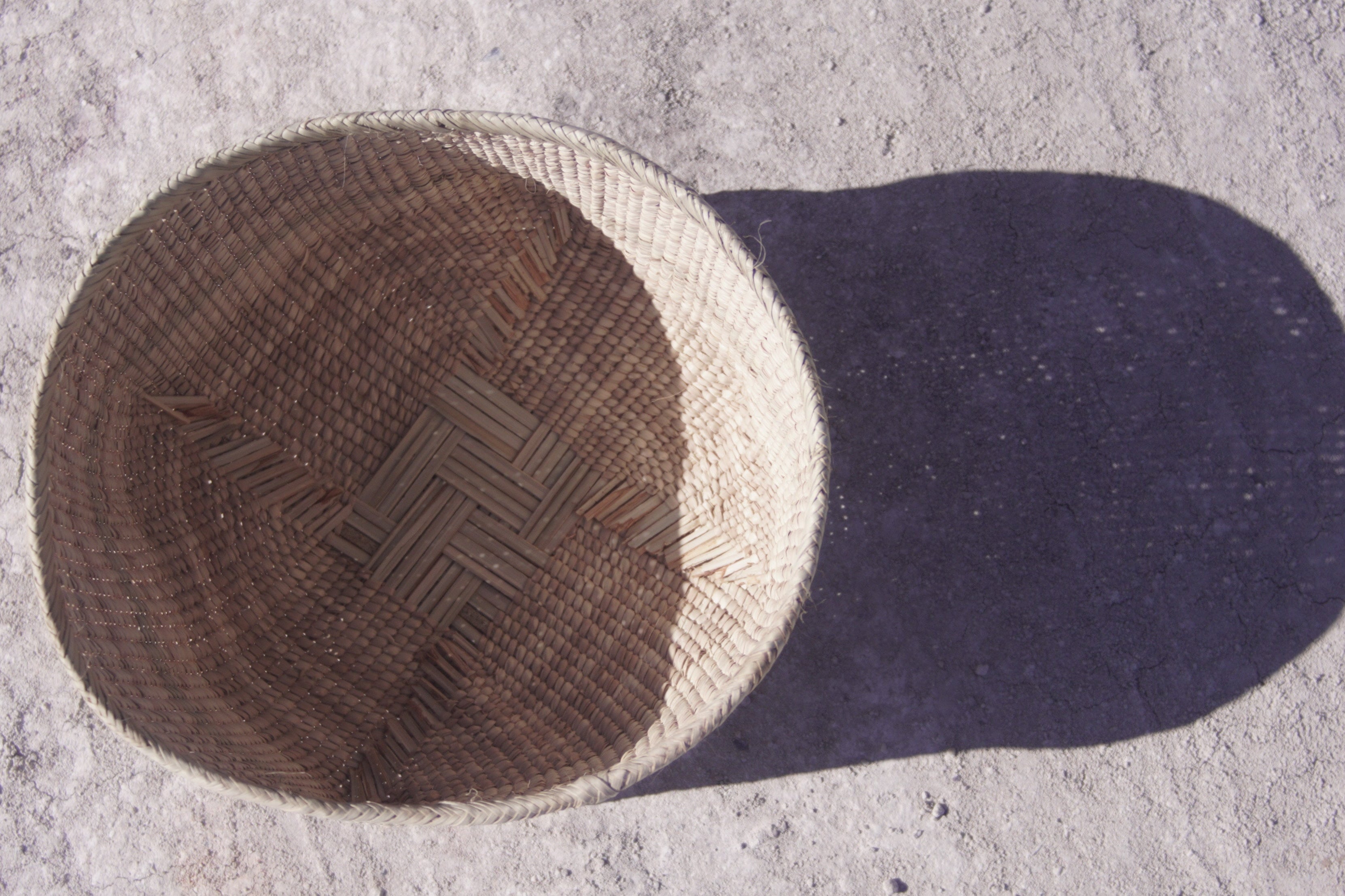 Ilala wonky basket photgraphed from top and shows cross shaped woven pattern