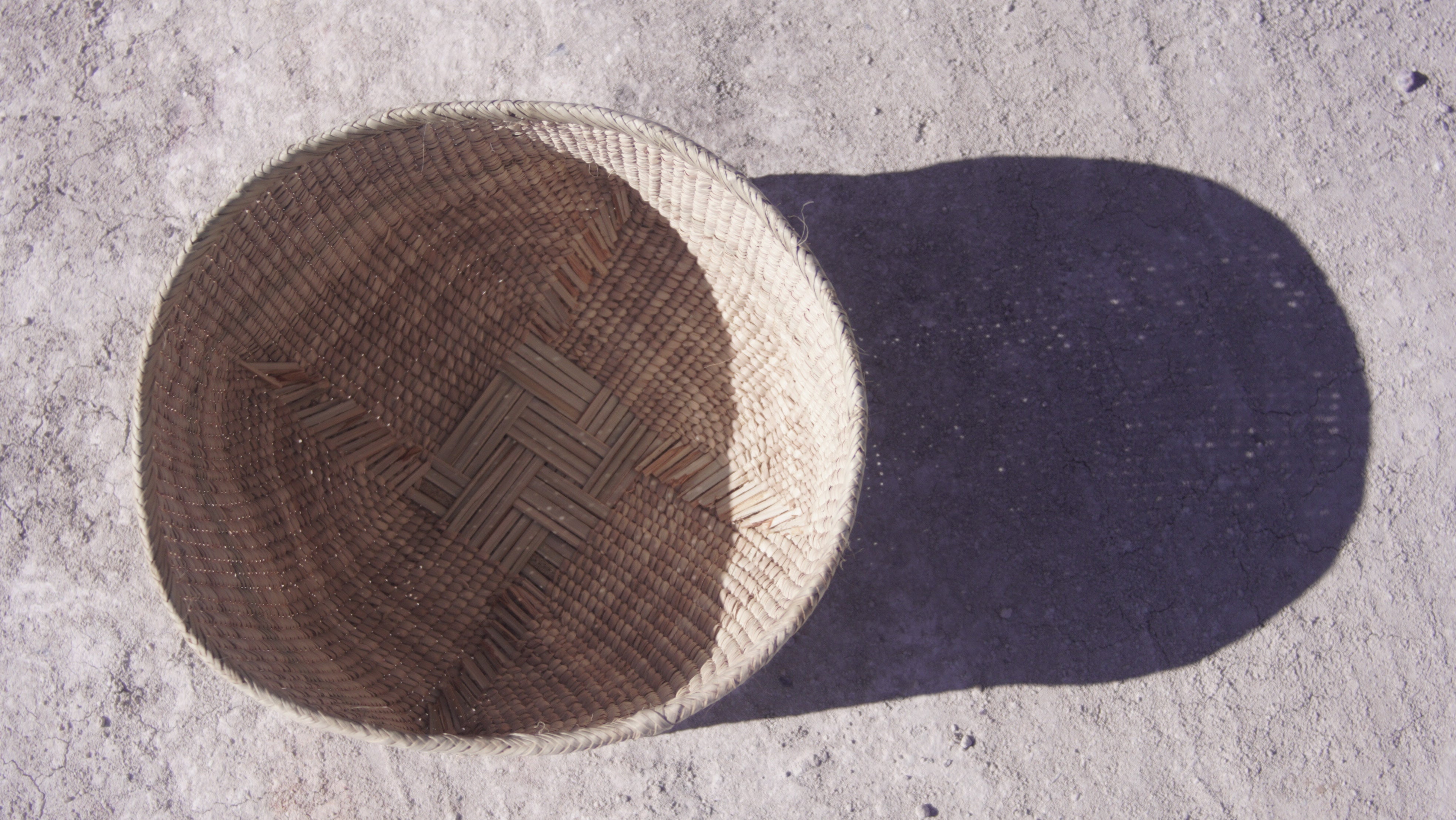 Ilala wonky basket photgraphed from top and shows cross shaped woven pattern