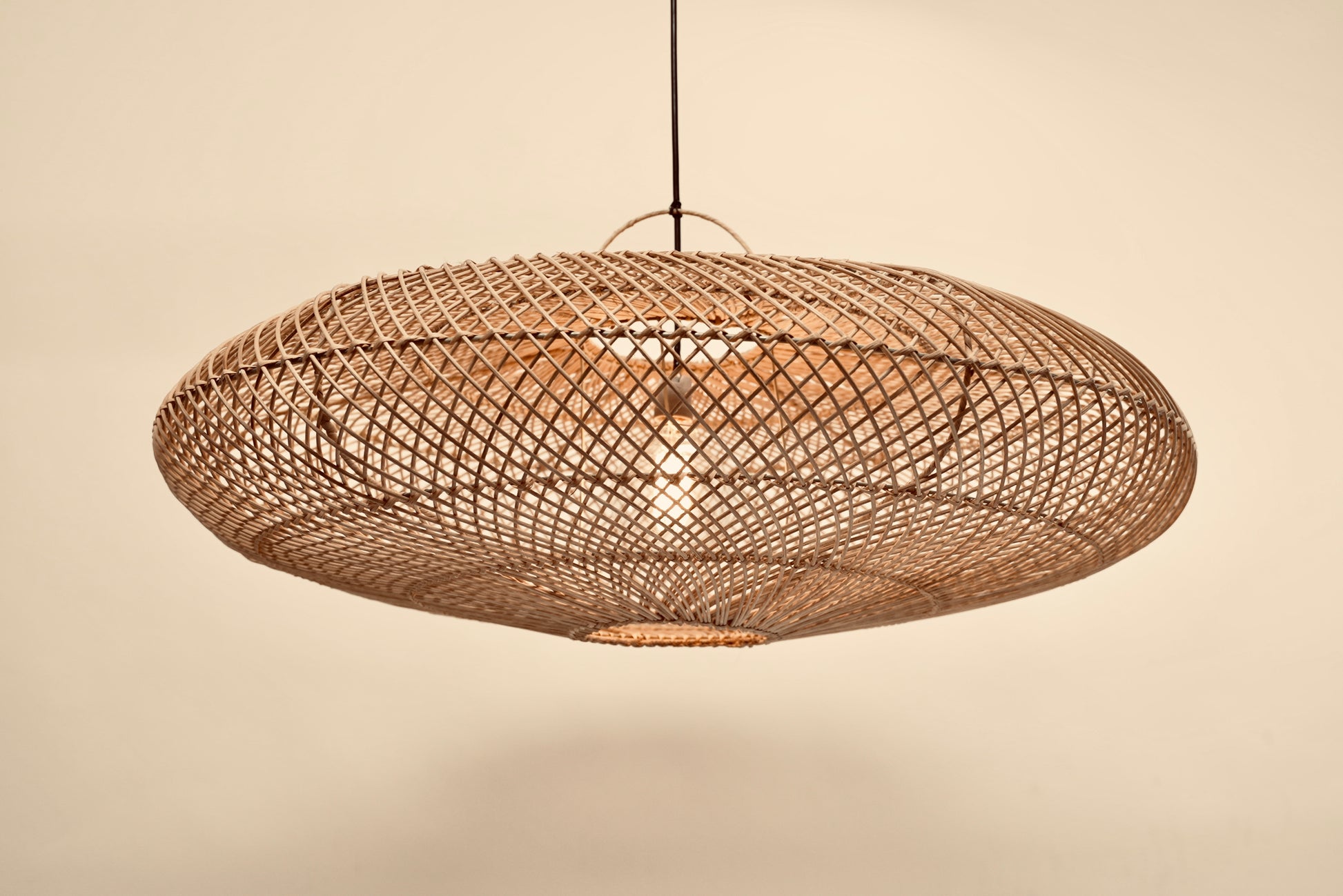 The UFO pendant woven with bamboo on stainless steel frame locally made and customisable