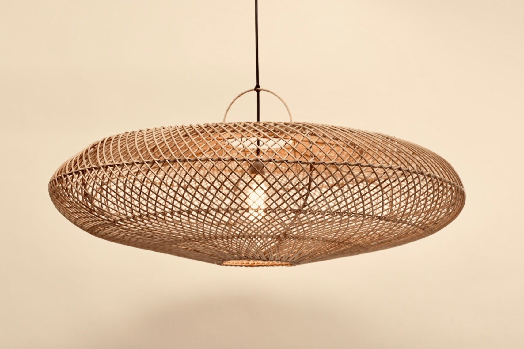 The UFO statement lighting hanging pendant woven with bamboo on stainless steel frame locally made and customisable