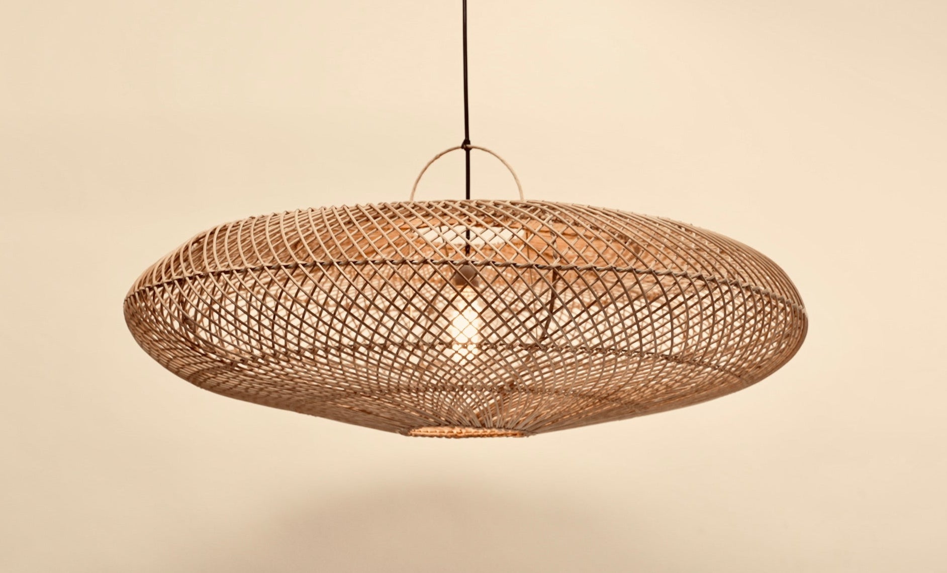 The UFO statement lighting hanging pendant woven with bamboo on stainless steel frame locally made and customisable