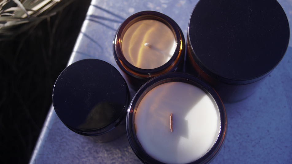 Soy candles in amber glass jars in different sizes