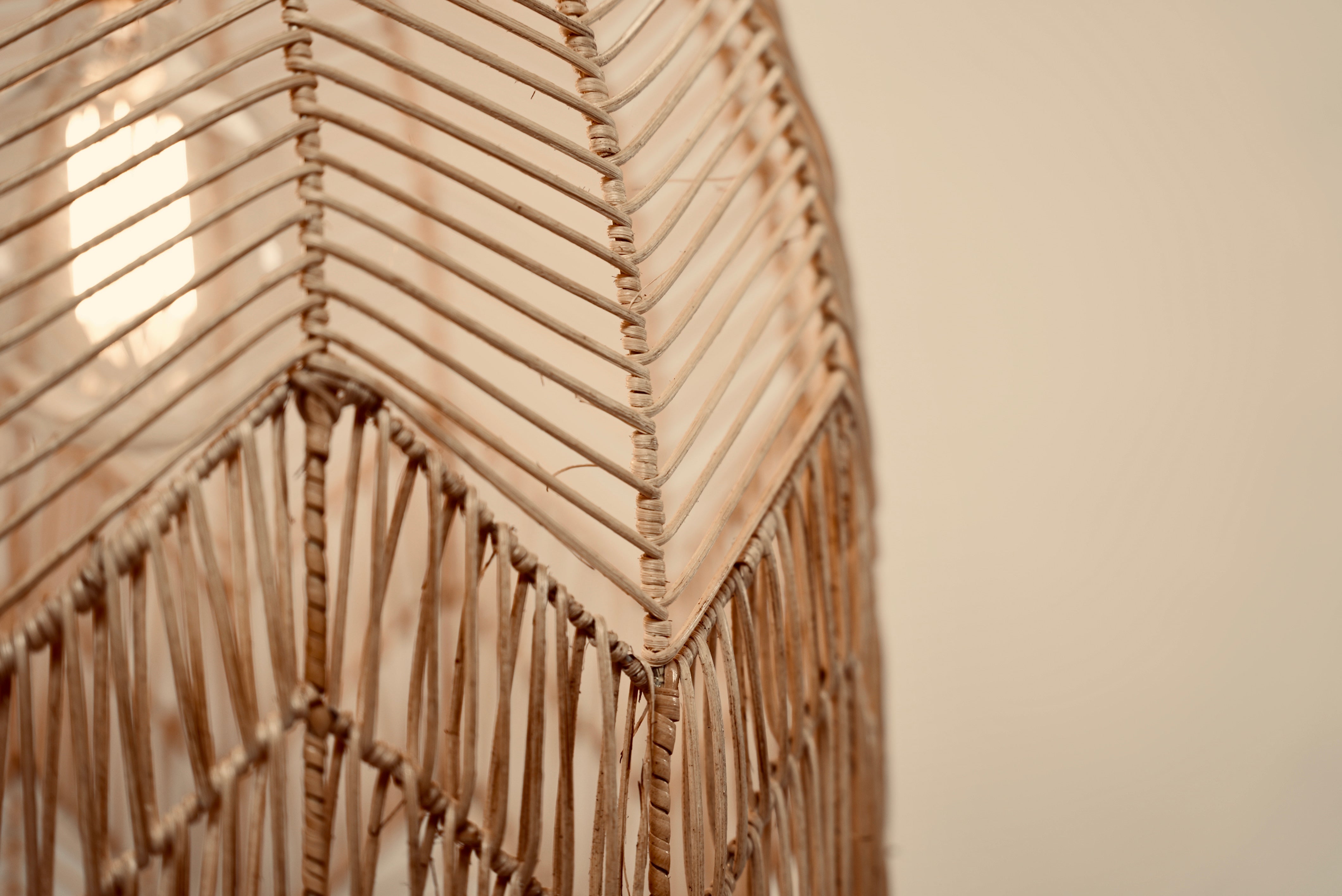 The Circus pendant woven from rattan peel on stainless steel frames locally made and customisable in various sizes