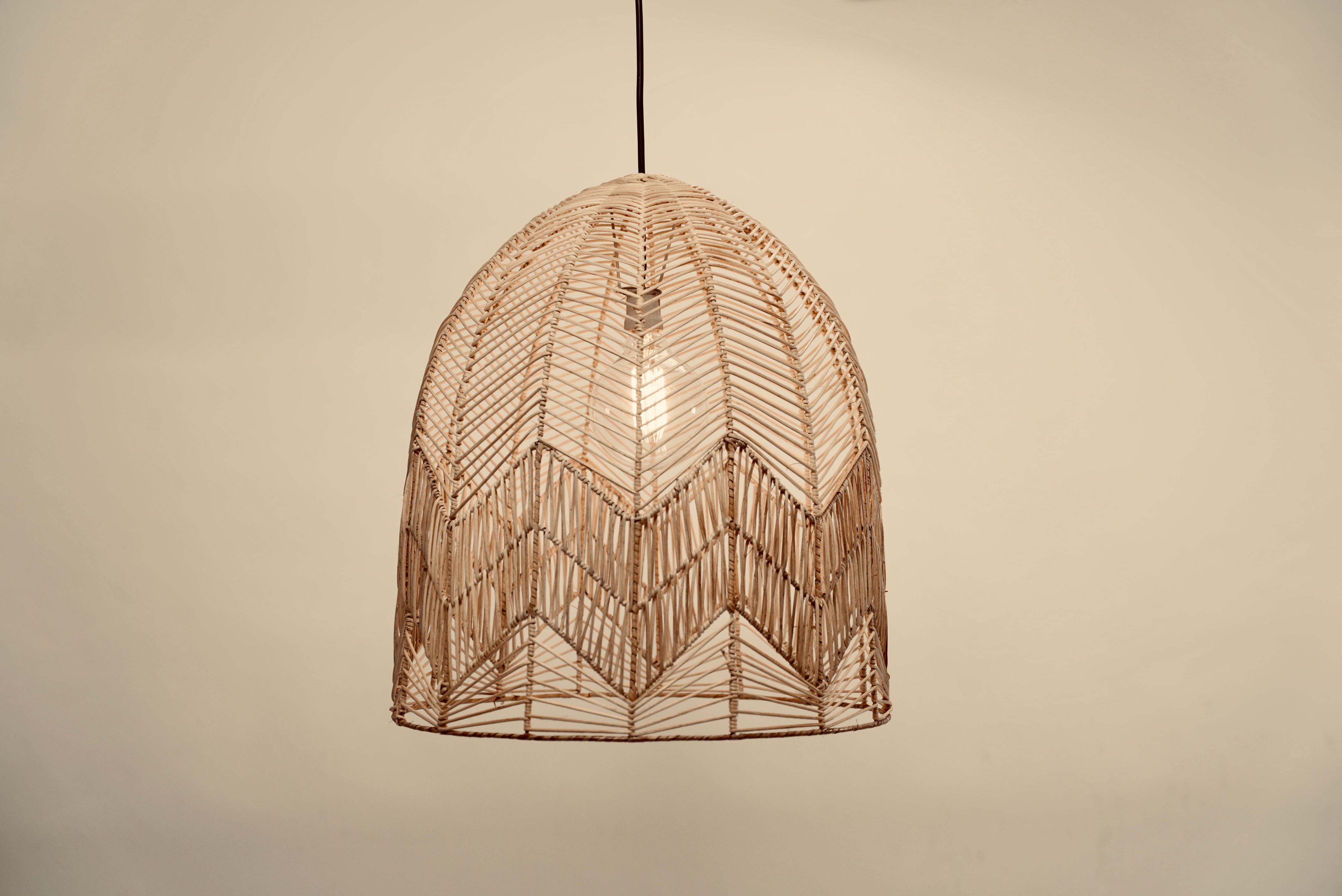 The Circus pendant woven from rattan peel on stainless steel frames locally made and customisable
