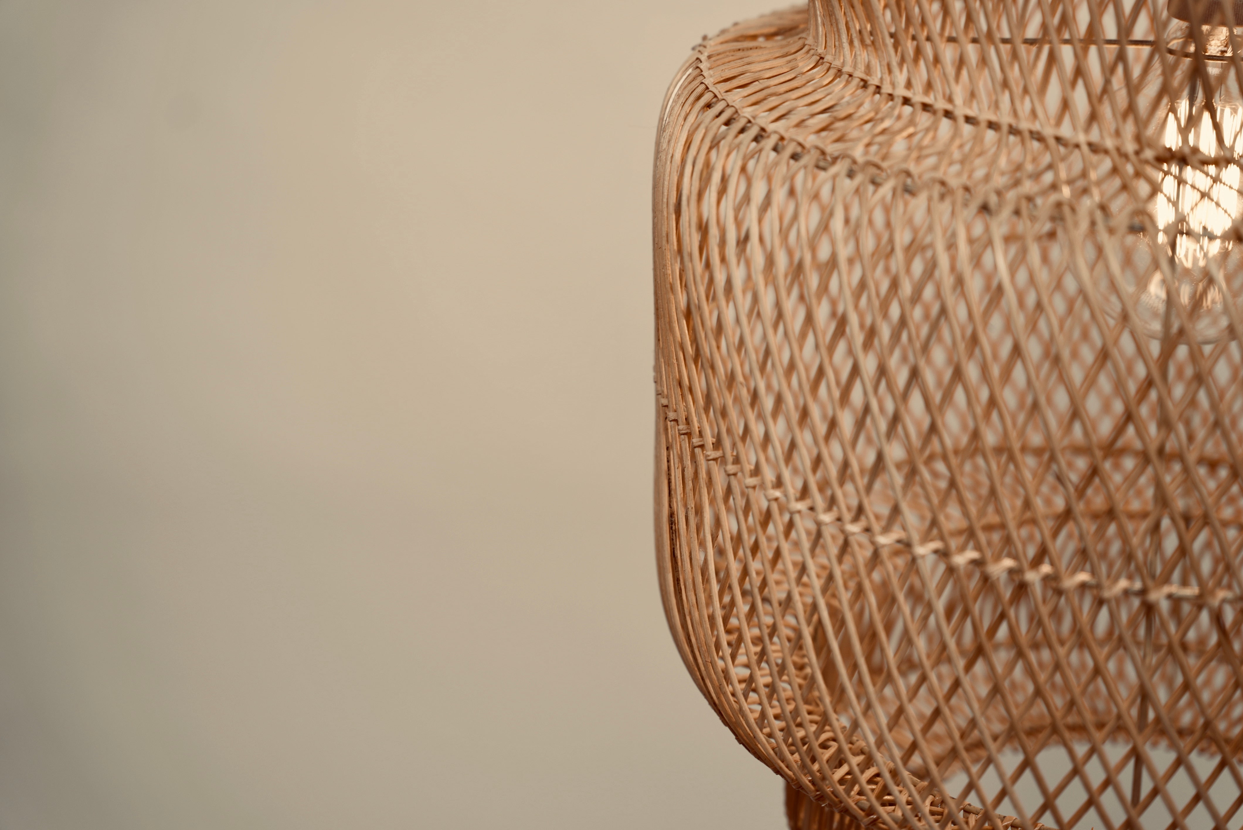 The Grand Daddy pendant woven from bamboo on stainless steel frames locally made and customisable luxury resort lodge lighting