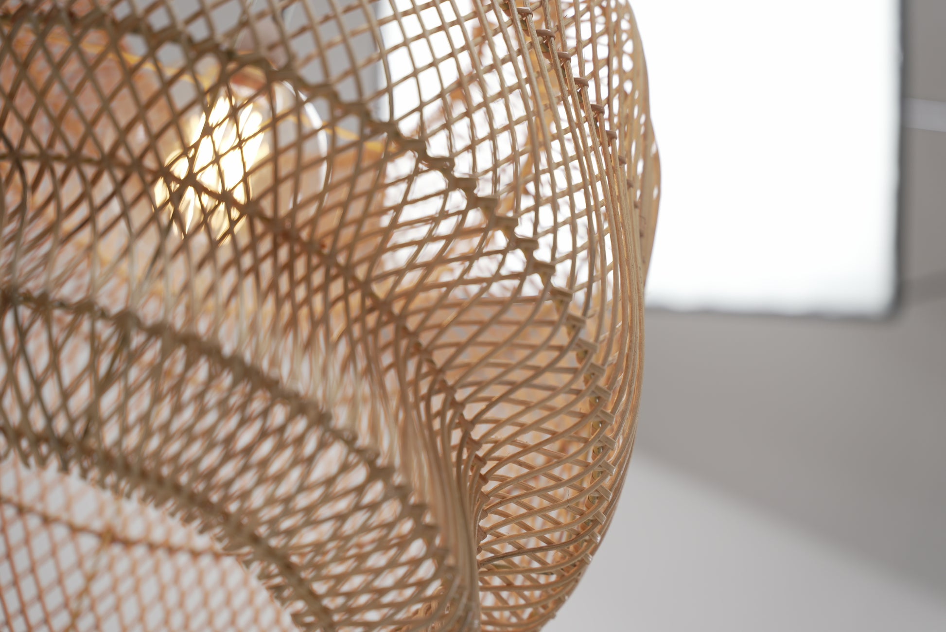 The Grand Daddy pendant woven from bamboo on stainless steel frames locally made and customisable in natural black or mixed pattern