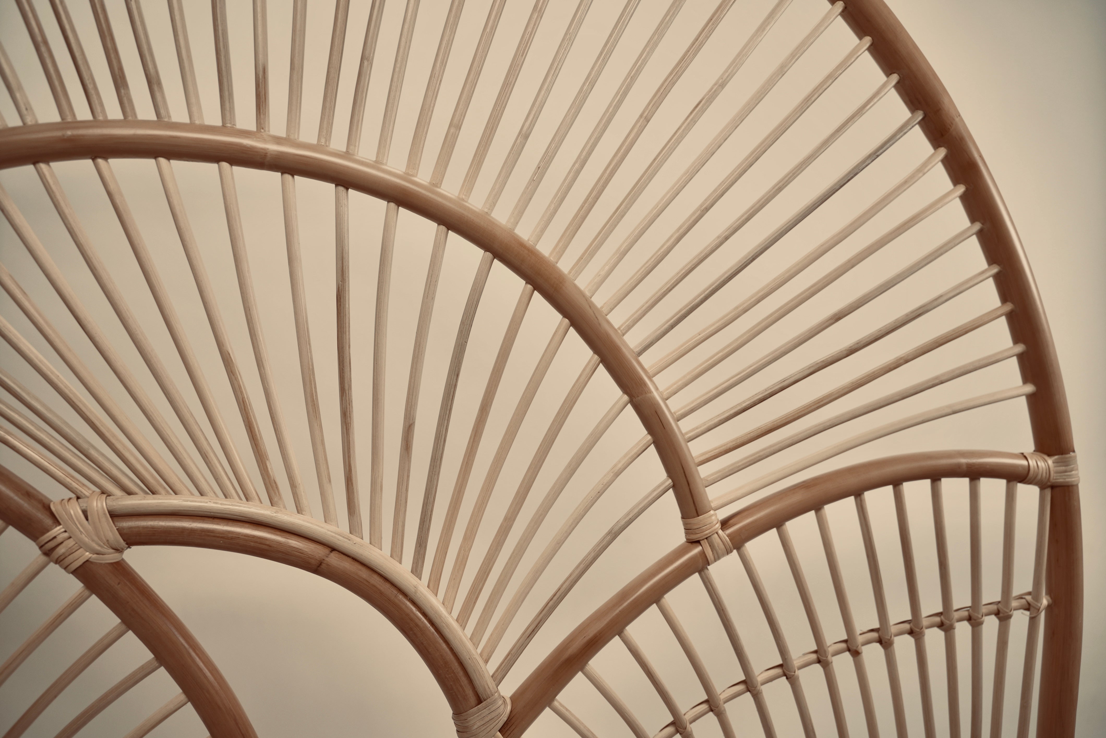 The Muji headboard photographed against a neutral wall showcasing the intricate curved details for calm bedrooms