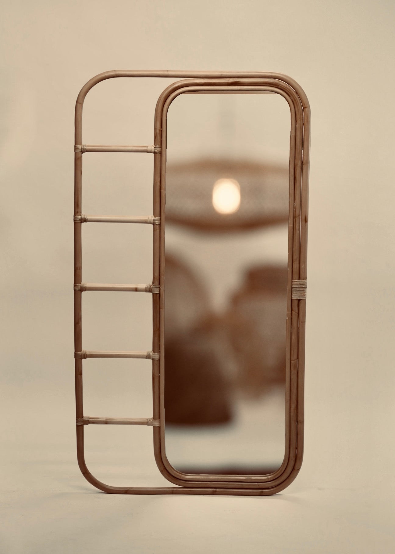 The Ibu mirror boho chic beach style rattan mirror with hanging rods