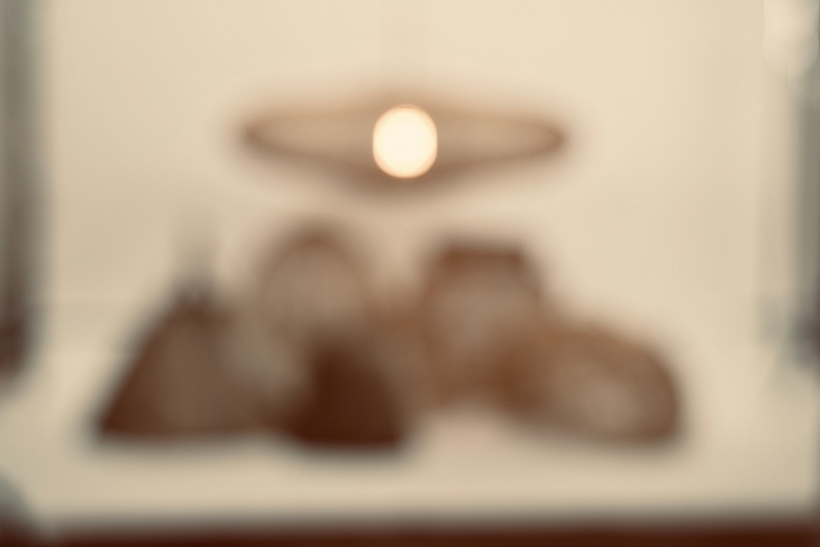 The UFO pendant woven with bamboo on stainless steel frame locally made and customisable