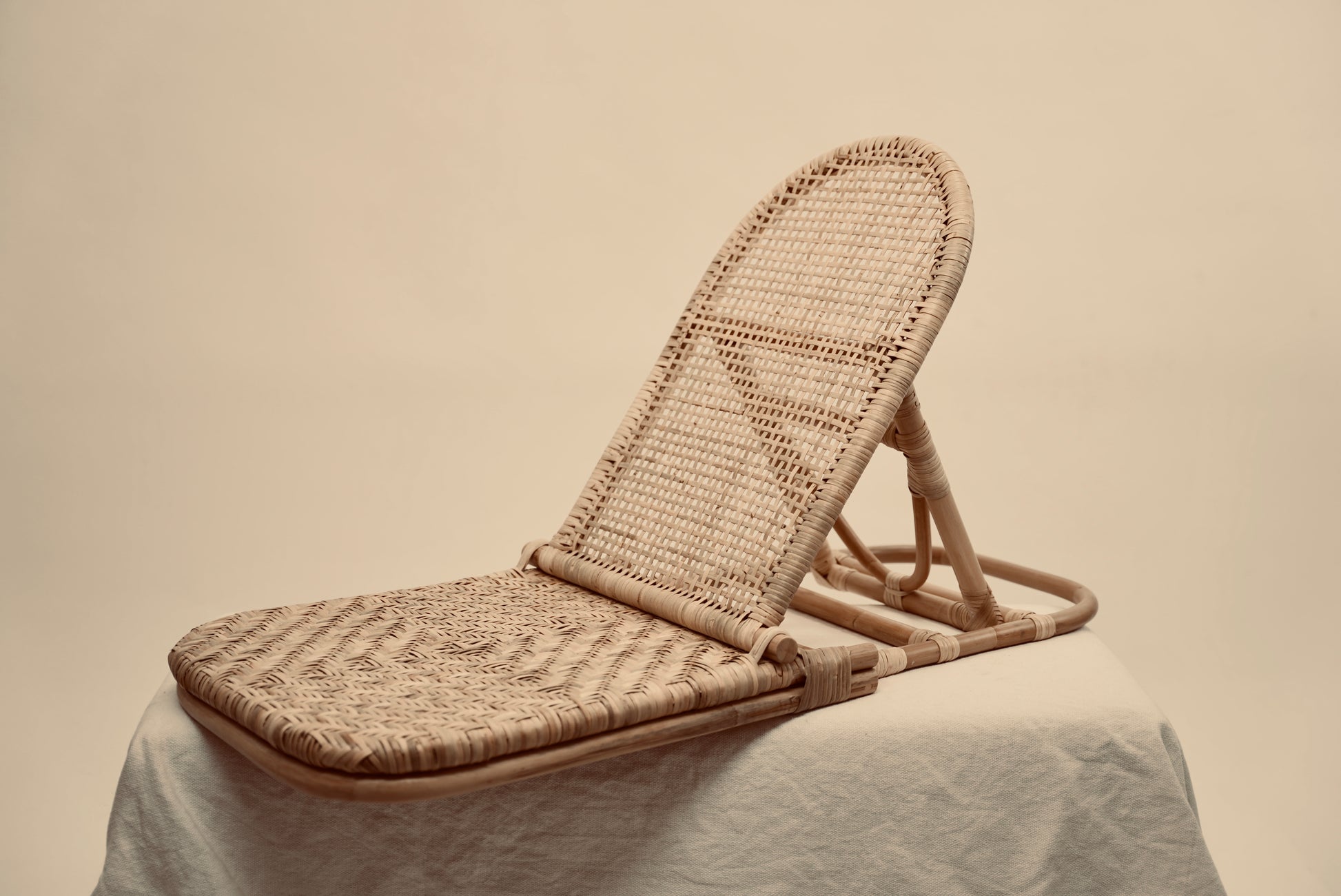 The foldup Rattan beach chair by Crates of Beauty