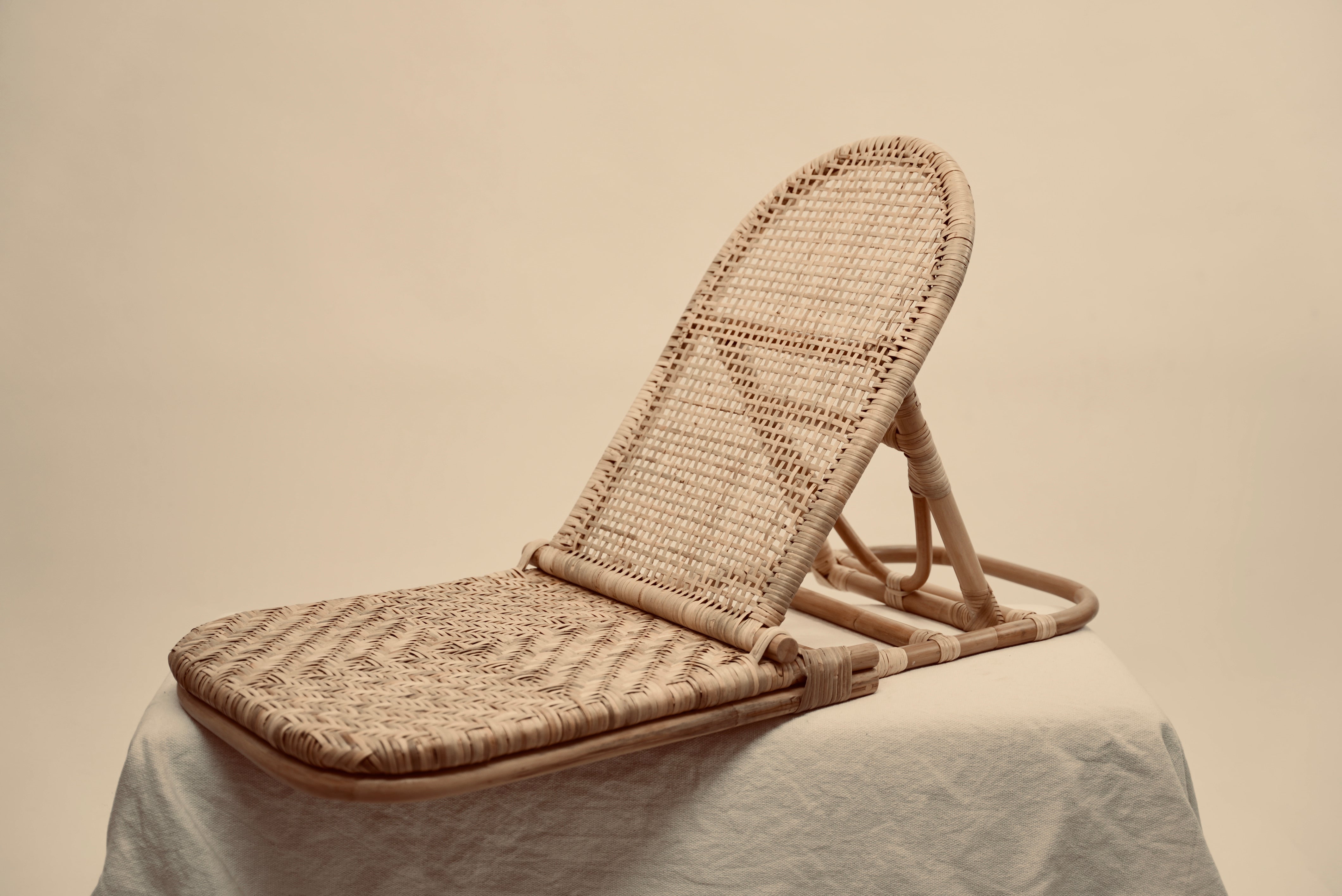 The foldup Rattan beach chair by Crates of Beauty