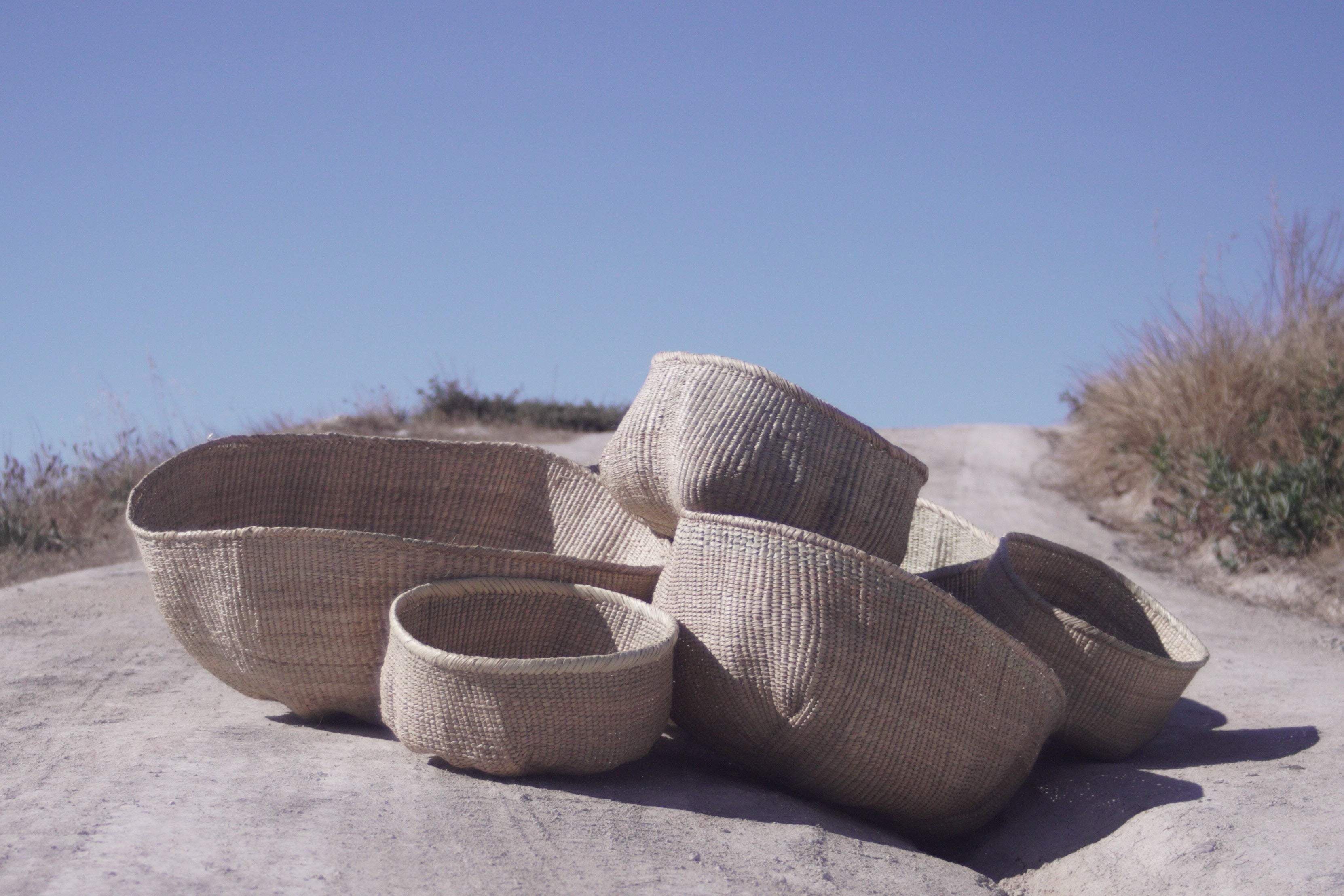 Ndebele woven basket from natural fibres for home decor, soft furnishings, lodges, restaurants, property developments and interior projects in various customisable sizes